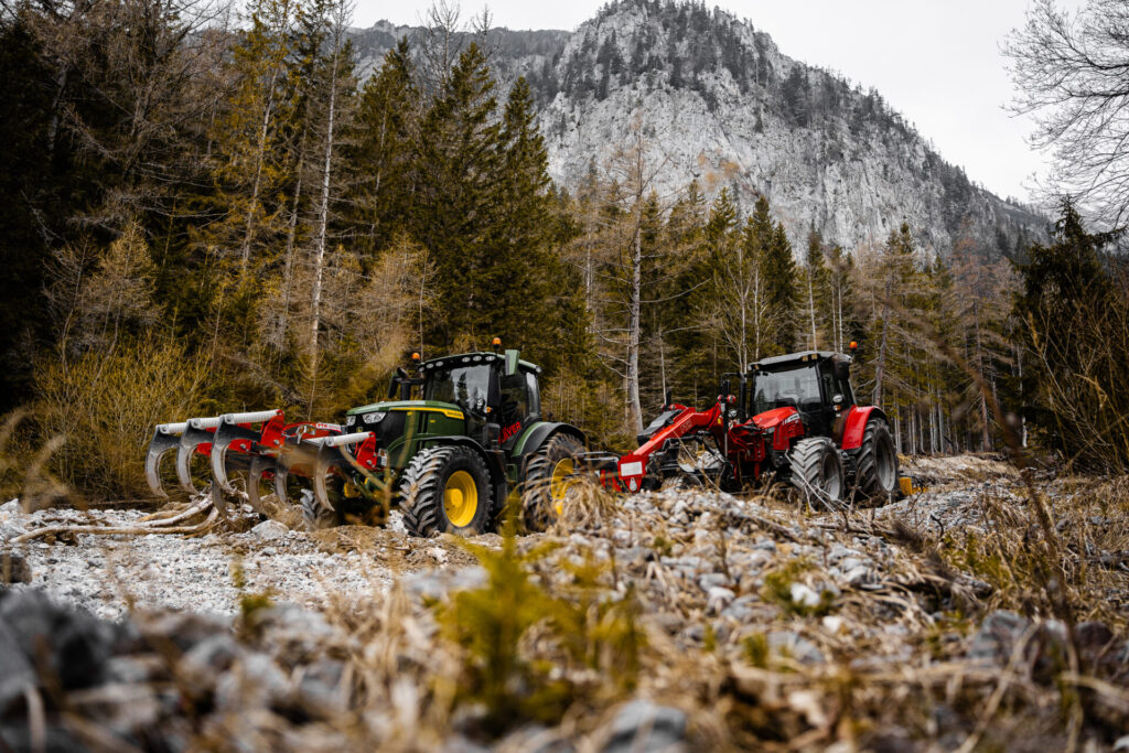 a group of tractors in a forest